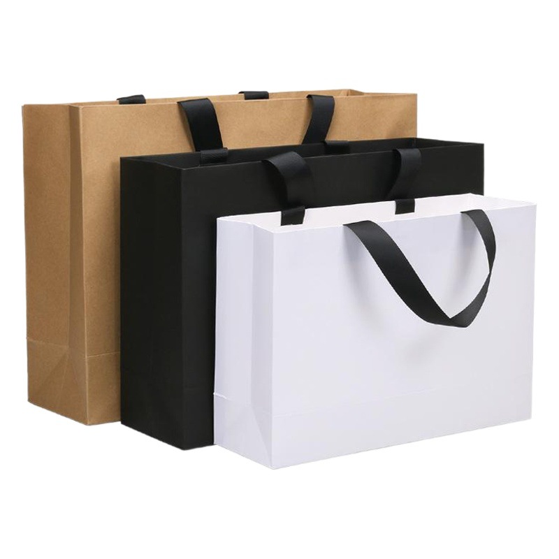 Bolsa de regalo de piel de vaca simple bolsa de compras bolso de ropa en stock bolsa de embalaje de cuerda de hilo cinta bolsa de cartón blanco
