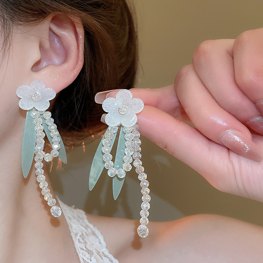 Pendientes de flor de lazo elegante de súper hada de plata Pendientes de moda de lujo ligero francés Pendientes de todo fósforo dulce de estilo literario