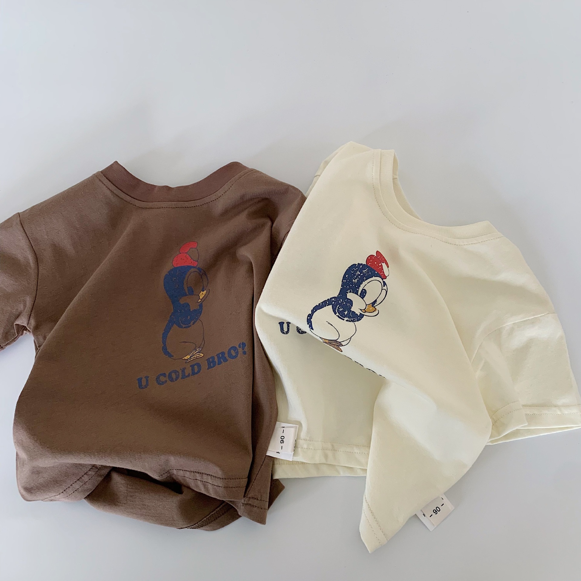 Camiseta de manga corta para niños Maibao 2025 verano nuevo estilo coreano niños y niñas tops de dibujos animados a ropa para niños al por mayor