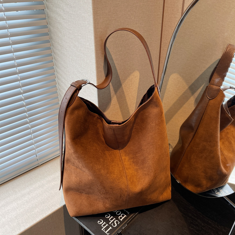 Bolsa retro esmerizada de terro para mujeres 2025 nueva gran capacidad de viaje de un solo hombro bolsas de cubo bolsas de ocio