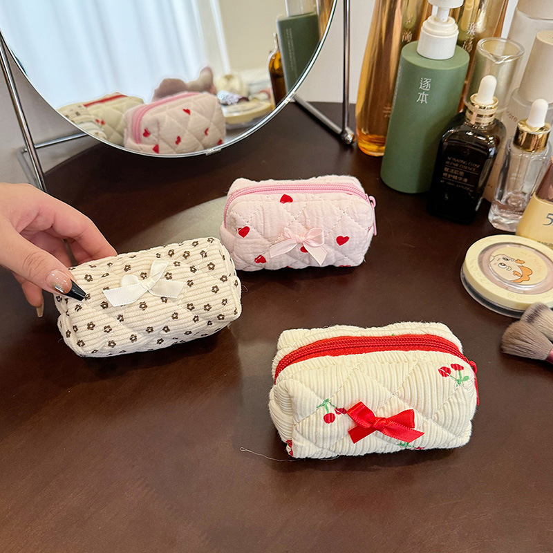 Bolso cosmético con lazo de corazón para niña Bolso de lavado portátil portátil de gran capacidad para mujer Bolsa de almacenamiento de viaje Ventas directas de fábrica