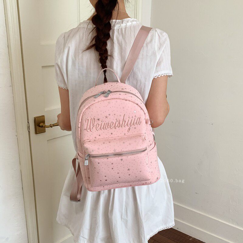 Mochila de moda mochila 2026 mochila de gran capacidad para estudiantes universitarios en clase nueva primavera bolsa de letras lienzo para mujeres
