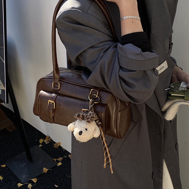Bolsa de bolos de mano de moda coreana para mujeres 2025 nueva bolsa de almohada casual universal bolsas de hombro para viajar bolsas de brazo