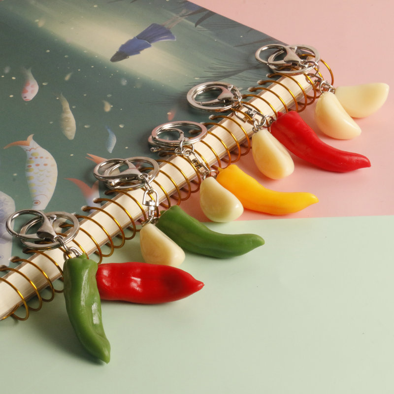 Simulación en stock llavero de ajo creativo anti-perdido llavero de coche estudiante mochila colgante Chili food and play fabricante
