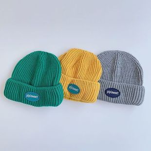 Autumn and Winter Children's Fashion letter wool hat boys and girls melon skin hat all-match ear protection warm pullover knitted hat tide