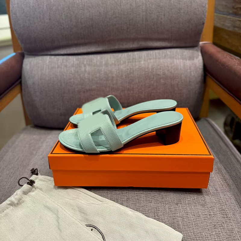 鼎羊皮の新型真皮平底ネット赤同タイプのスリッパ女性夏外着一字引きビーチカジュアル太さと涼しさ引き