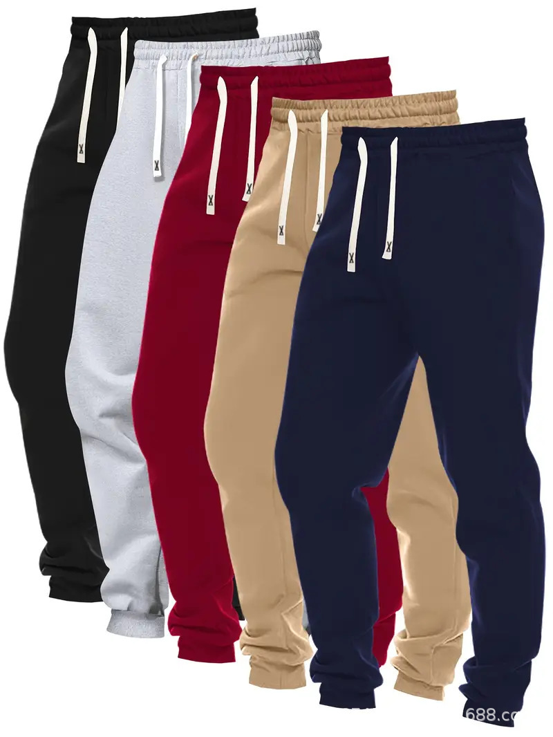 2026 explosión transfronteriza pantalones deportivos de moda masculinos de cinco piezas de color sólido cómodos ociosos pantalones de alimentación directa plataforma