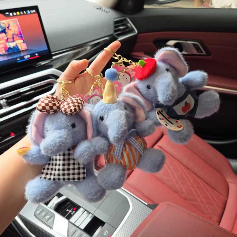 漫画の動物のオリジナルの元気の小さい象のぬいぐるみのキーホルダーのカップルのかわいい子供を挟む機は学生の贈り物を飾ります。|undefined