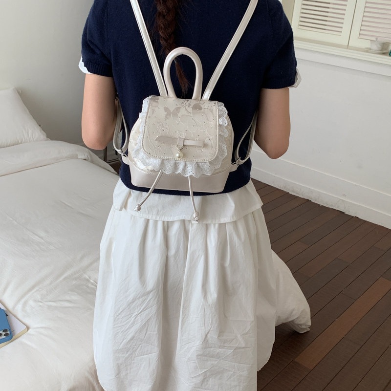 2026 mini mochila de verano dulce pequeña mochila de estilo de viaje nuevo popular mujer encaje arco de chicas