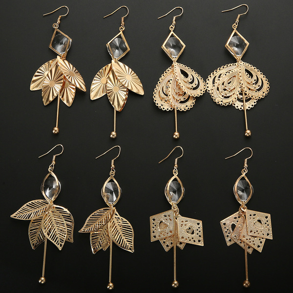 fashionable golden geometric earrings with tassels