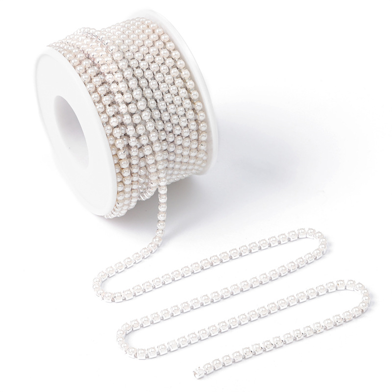 Off-white pearls with silver background