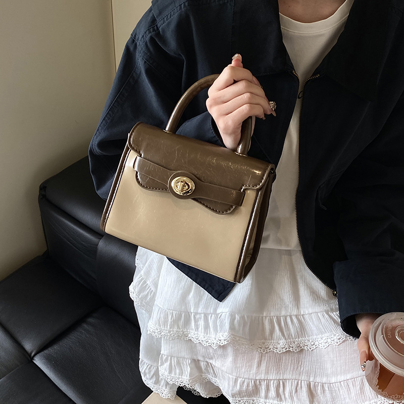 Moda 2025 primavera y verano nueva versión coreana de la retro Kelly bolso femenino 100 bolsos de hombro, nicho, bolso casual simple