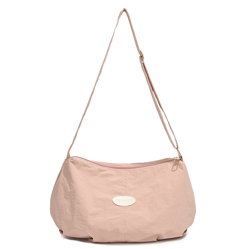 Bolso de color sólido universal 2025, nuevo bolso de bolsas de bolsas de bolsas de moda de hombro, mochila de viaje casual para hombres y mujeres.