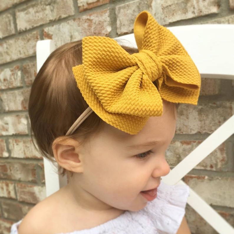 Children's hairgrip with bow