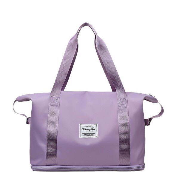 Capacious handheld luggage folding storage bag for traveling
