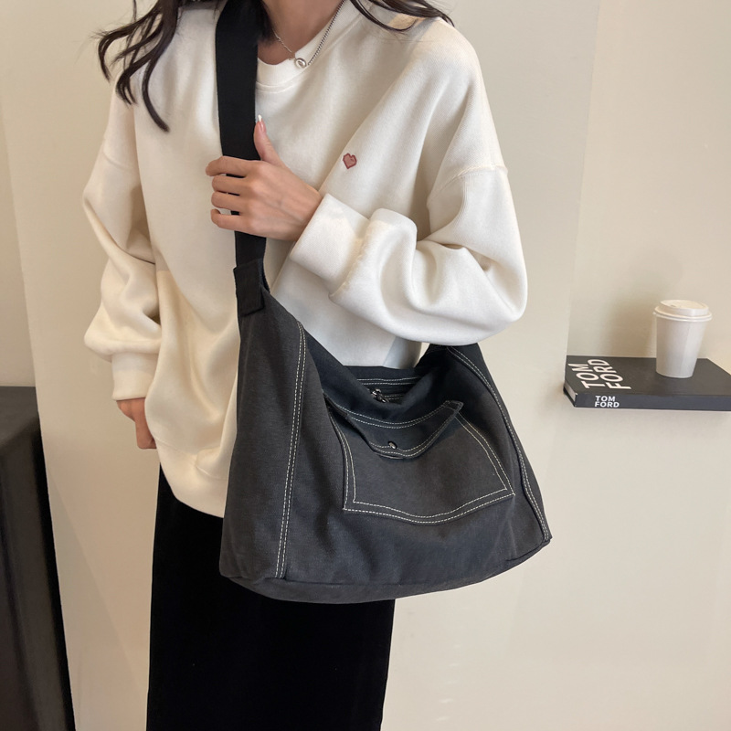 Bolso de lona de gran capacidad simple japonés bolso de mensajero coreano para mujer 2024 nuevo bolso de mensajero de un solo hombro de tendencia casual