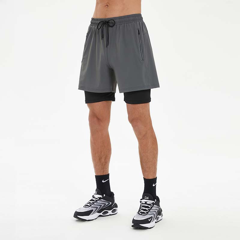 Pantalones cortos deportivos de secado rápido de los hombres de verano forro de doble capa de alta elasticidad para correr pantalones laterales transpirables con cremallera en stock al por mayor