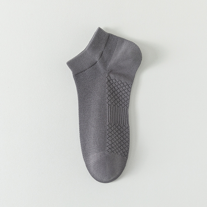 Calcetines de algodón de color sólido para hombres de verano anti-bollar calcetines de barco para hombres sin hueso 100% algodón embalaje independiente de masaje fondo calcetines de malla