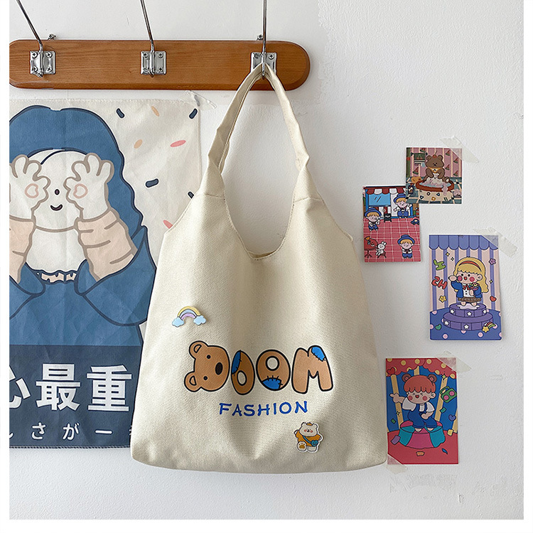 2021 Summer Japanese-style simple canvas bag, student backpack, single-shoulder handbag for going out, cartoon badge cotton bag undefined
