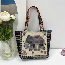 手提包新款时尚民族风绣花女单肩包简约学生补课袋帆布购物女包包