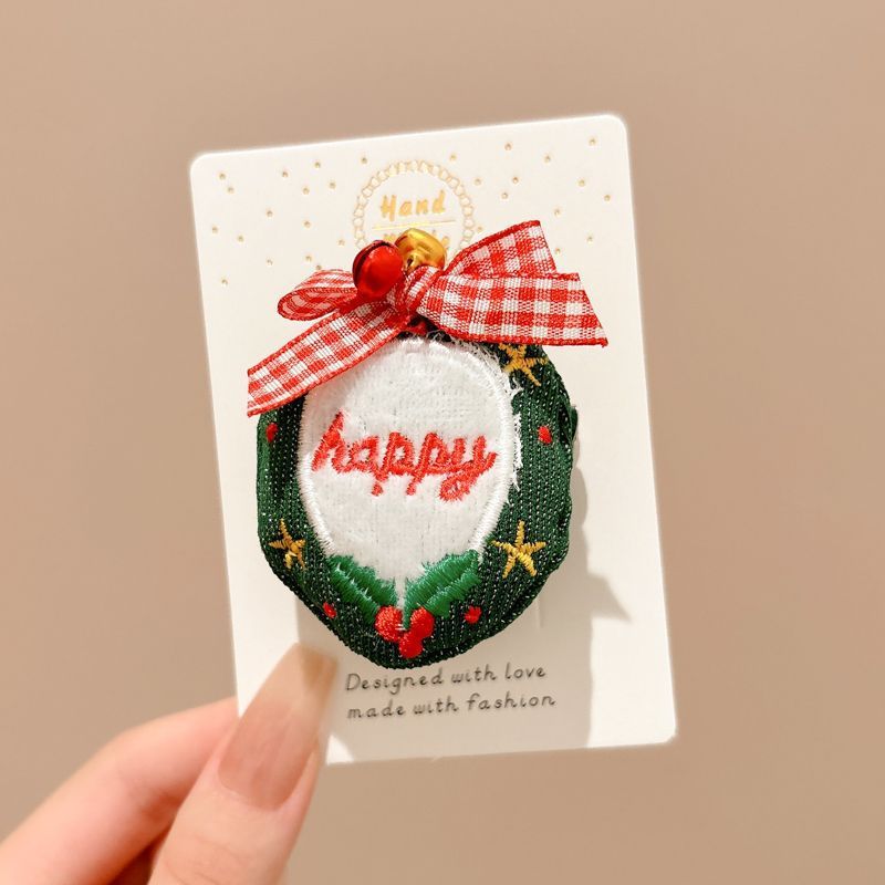 Navidad alce broche adorable Santa Claus pin creativo regalo peluche árbol de Navidad insignia decoración al por mayor