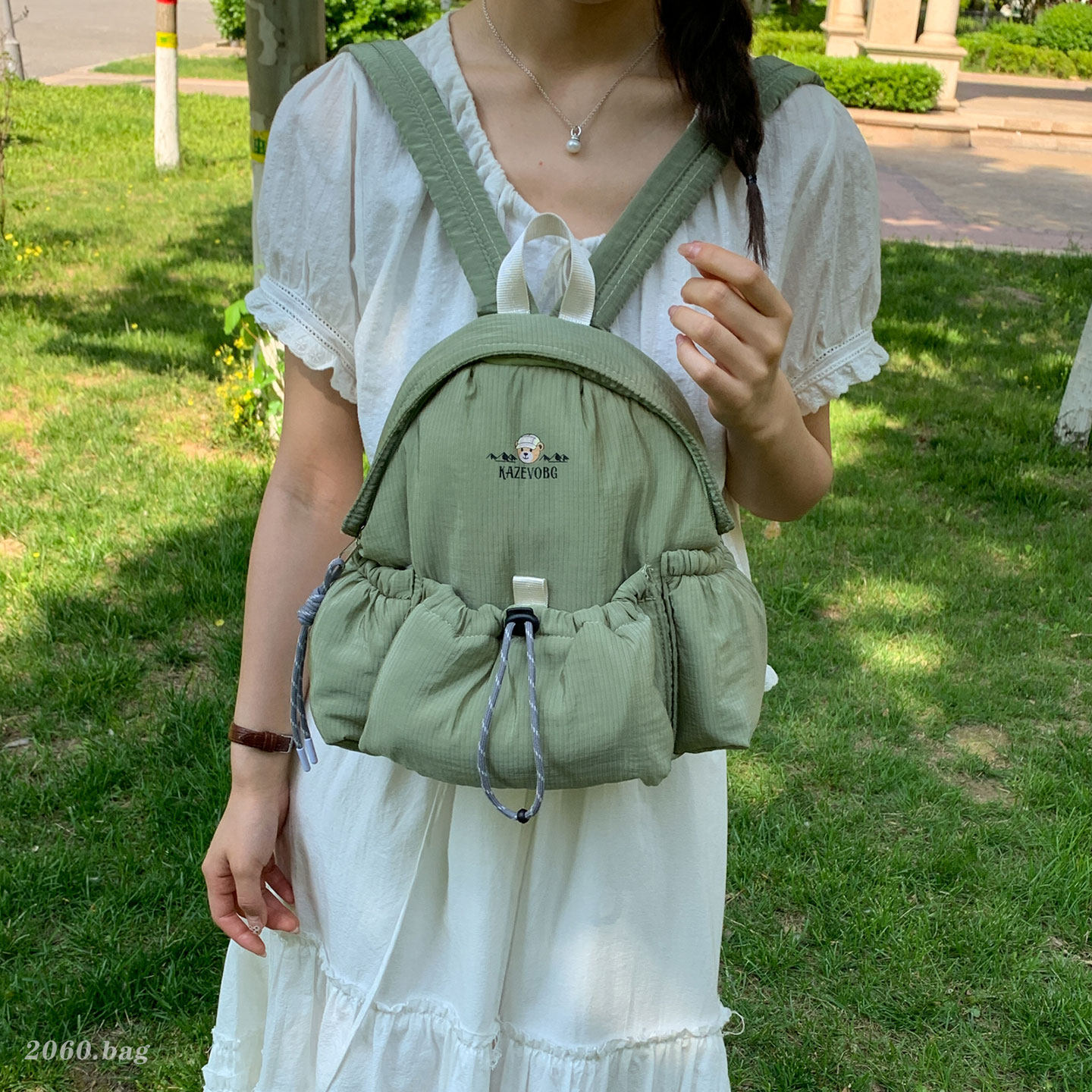 Nuevo estilo de viaje 2026 Bundokou mujer mochila funcional ocio impermeable cuerda de extracción al aire libre mochila de montaña de viento ligera
