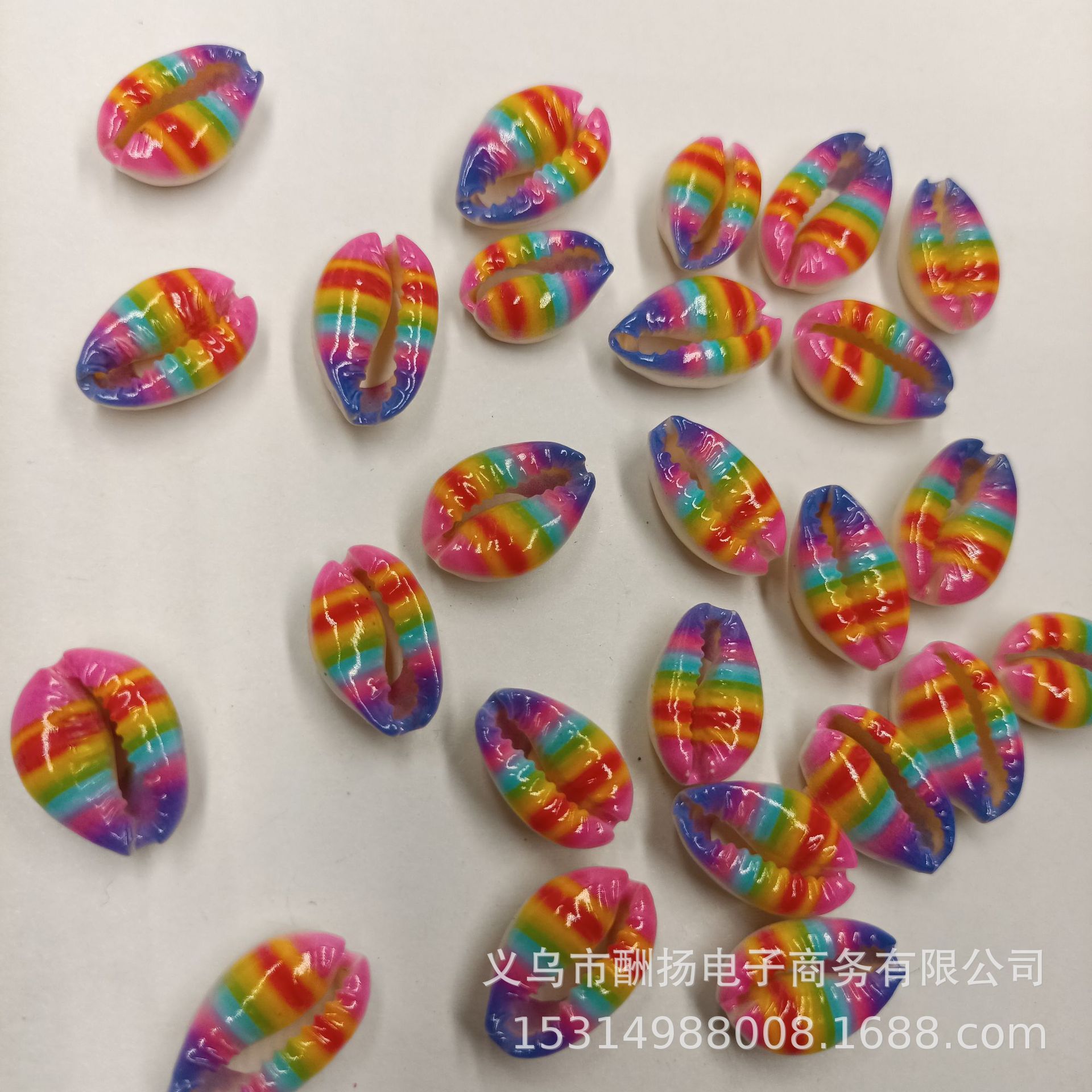 New striped pattern in rose yellow, red, yellow, blue, and purple. 1 piece.