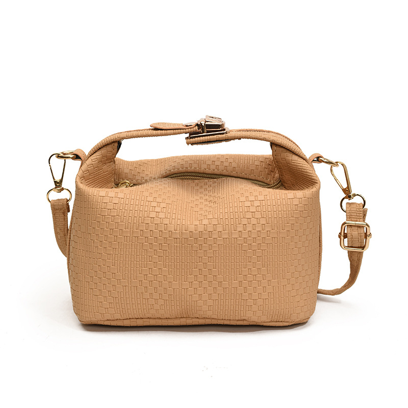 Bolsa de mano a rayas de moda coreana para mujeres otoño / invierno 2024 nuevo estilo simple bolso de hombro personalizado gran capacidad mochila