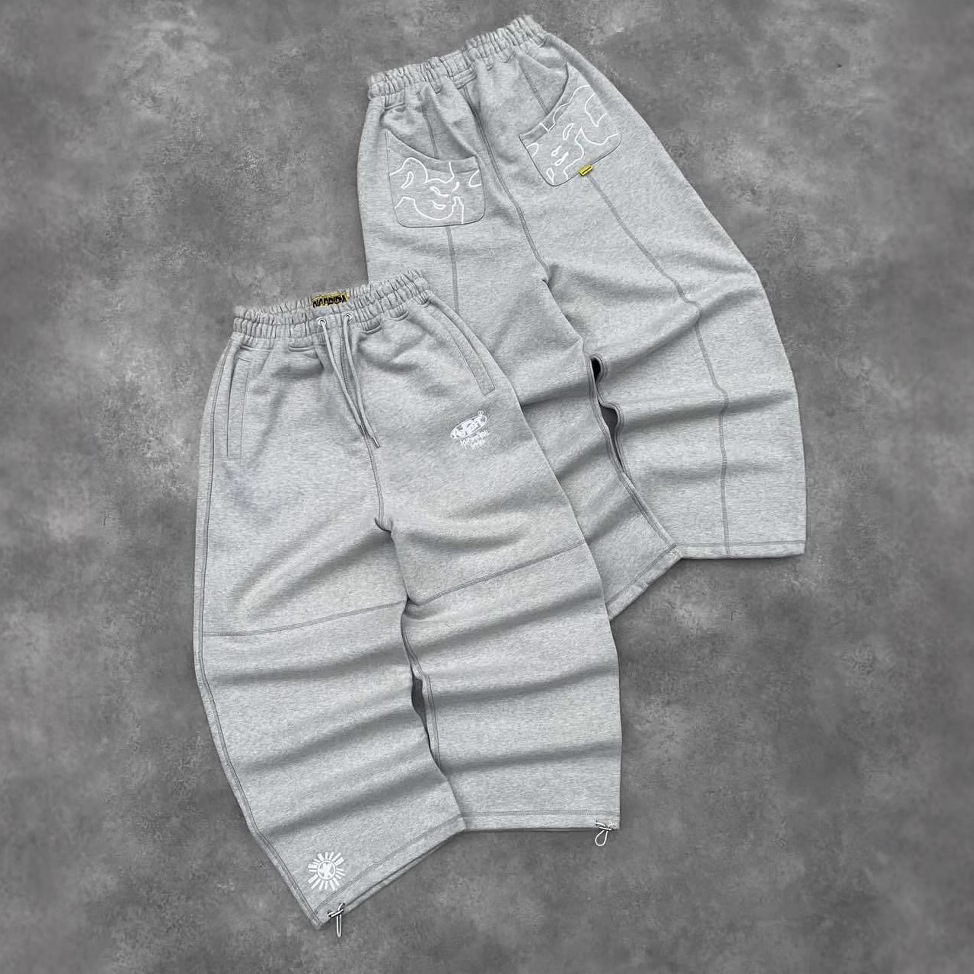 2025 marca de moda europea y americana transfronteriza estilo americano retro calle casual todos los días pantalones sueltos bordados gris hombres y mujeres