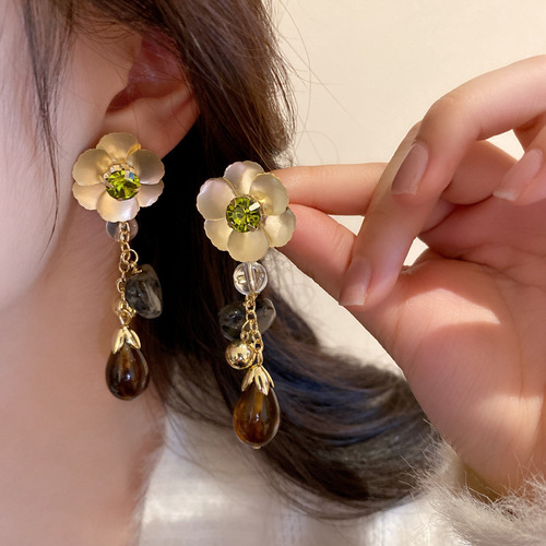 Silver needle flower bow metal tassel earrings European and American exaggerated luxury earrings niche creative new earrings for women