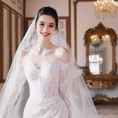 フランスの一字の肩の長袖のレースの魚尾の軽いウェディングドレス2025新型の新婦の小さい背のハイエンドの旅は門の紗を撮影します。