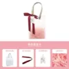 Pink ribbon + tag accessories + pink raffia