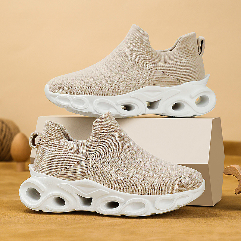 Transfronterizos niños zapatos deportivos de tela de vuelo primavera y verano nuevos niños y niñas malla transpirable ligera universal zapatos de calzado de tela de un pie