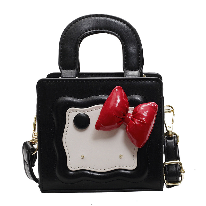 Bolso lindo japonés 2025 primavera nuevo bolso femenino lazo en contraste bolso de hombro mini bolso de mensajero para niños