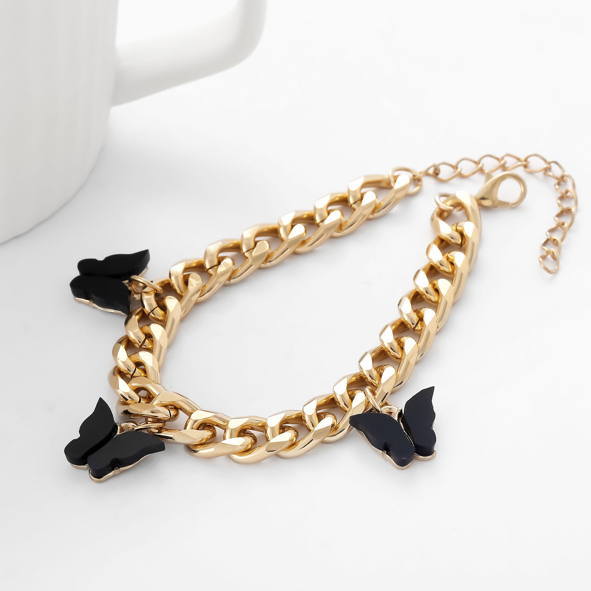 Set di gioielli in acrilico con catena a artiglio e diamanti_voghion.com