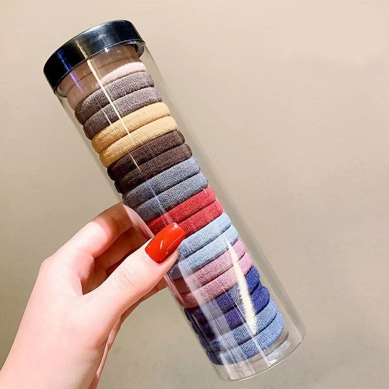 Bebés color caramelo de alta elasticidad pulgar anillo de cabello de niñas adornamiento de cabello de dopamina no daña banda de goma de cabello