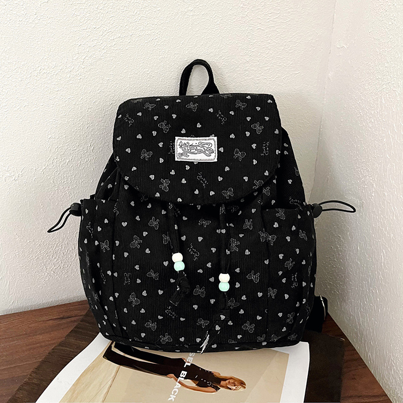 2026 mochila de viajes escolares de gran capacidad para mujeres coreanas frescas pequeñas ondas de diseño de moda mochila de moda mochila de moda
