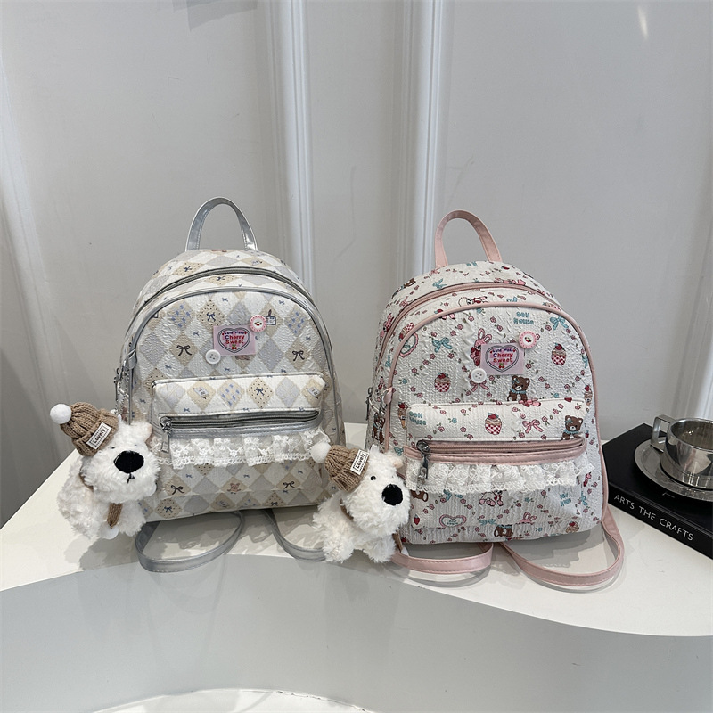 Mochila encantadora de moda coreana de mujer, alto valor de la cara, mochila de viaje diario, mochila universitaria universal.