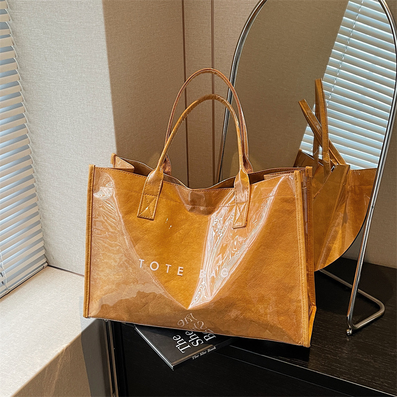 Women's large-capacity tote bag, Ozon's popular waterproof PVC shopping bag, versatile commuter handbag for women Women's large-capacity tote bag, Ozon's popular waterproof PVC shopping bag, versatile commuter handbag for women