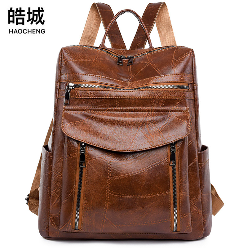 Comercio exterior nueva mochila de cuero suave para mujer casual moda todo fósforo color sólido mochila de viaje de gran capacidad