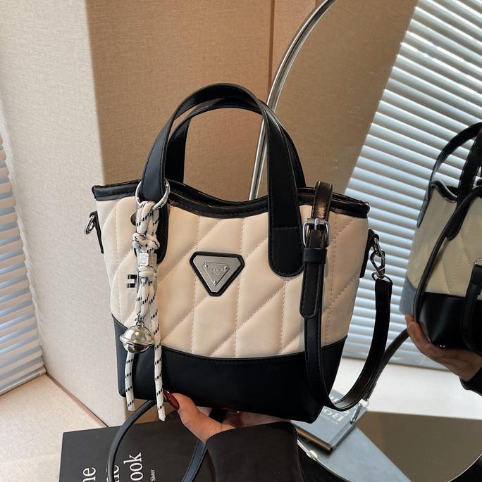 Bolso de cubo portátil de diamante de fuego súper caliente para mujer 2025 nueva tendencia bolso de hombro de todo fósforo bolso de mensajero de moda de nicho transfronterizo