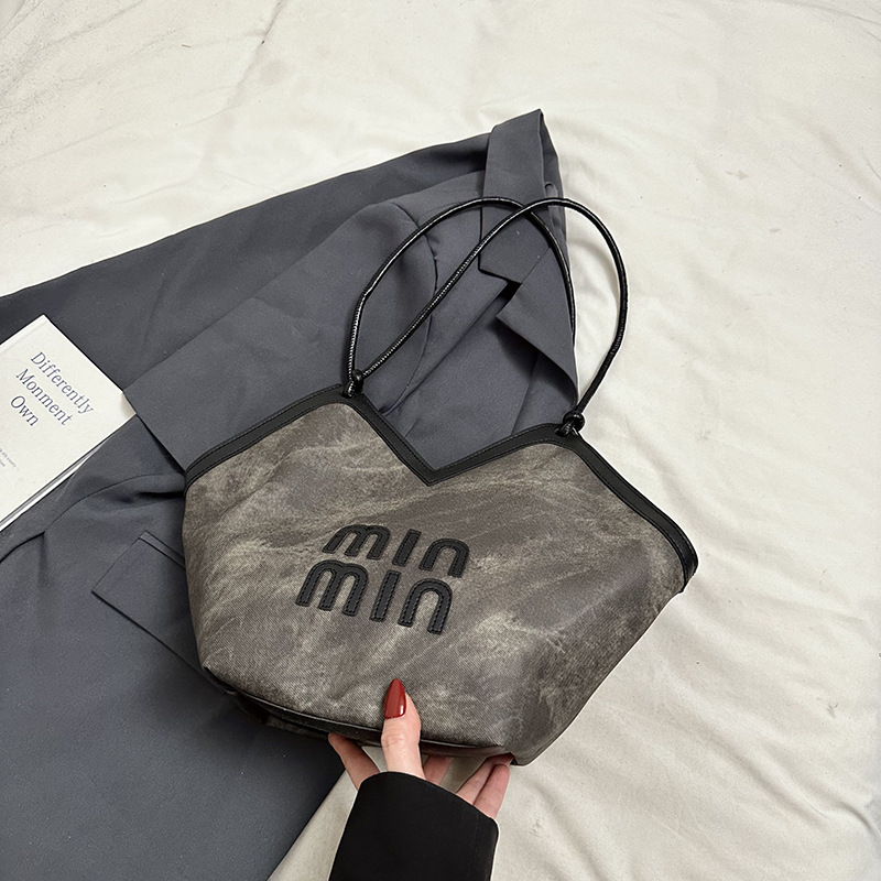 2024 nueva bolsa de gran capacidad para mujeres, bolso de hombro Sen Meng, bolso de diseño de nicho, bolso de viaje de alta calidad para mujeres