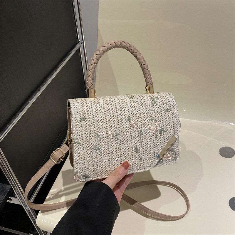 Diseño de nicho de alta sensación de tejido pequeño bolso cuadrado para mujeres 2024 nueva moda de paja bordada mochila de hombro