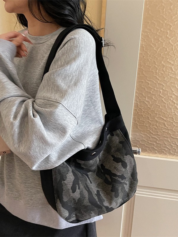 Casual bolso de camuflaje de gran capacidad para mujeres 2026 nuevo lienzo retrógrado simple mochila de hombro para viajar bolsa