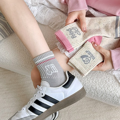 諸暨襪子女秋冬新款個性點子紗運動女襪批發美式潮酷中筒女士棉襪