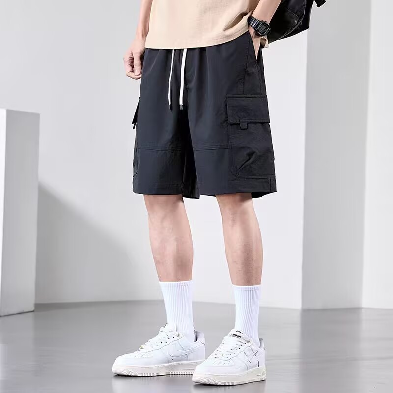 Camisas con menos ropa, pantalones casuales de seda de hielo ligeros, estilo fino de verano para hombres, monos estadounidenses transpirables, pantalones cortos sueltos de cinco puntos