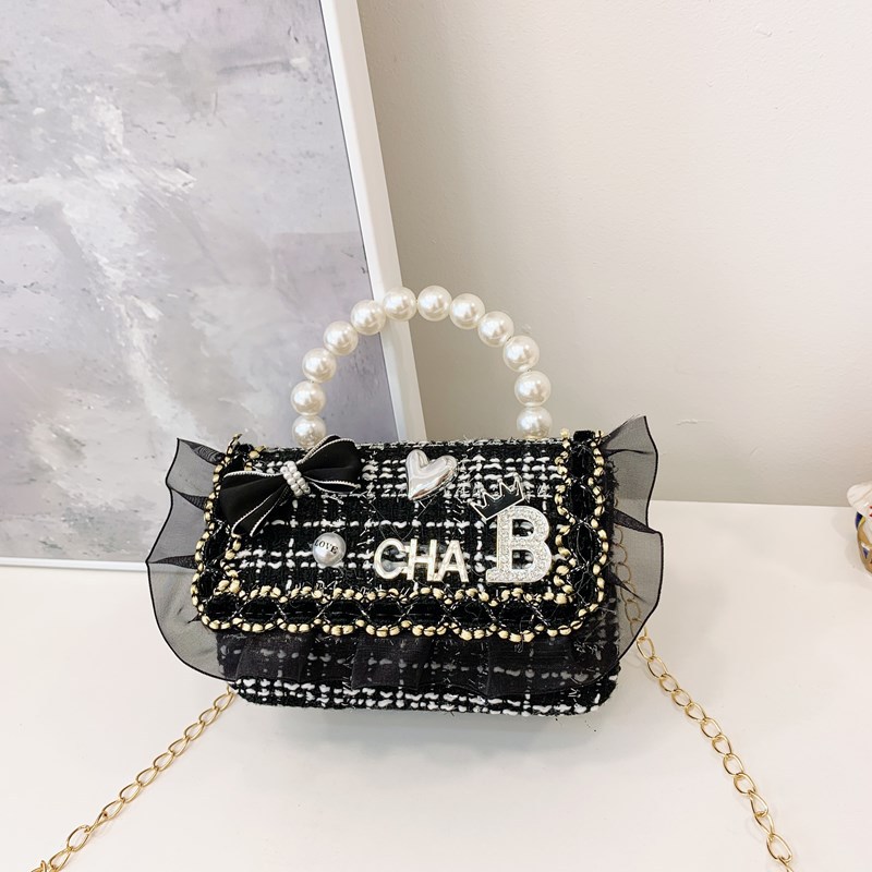 Bolso infantil, lindos arcos de perlas, bolso de mochila para niños, estilo coreano de moda, bolso de hombro para hombres y mujeres.
