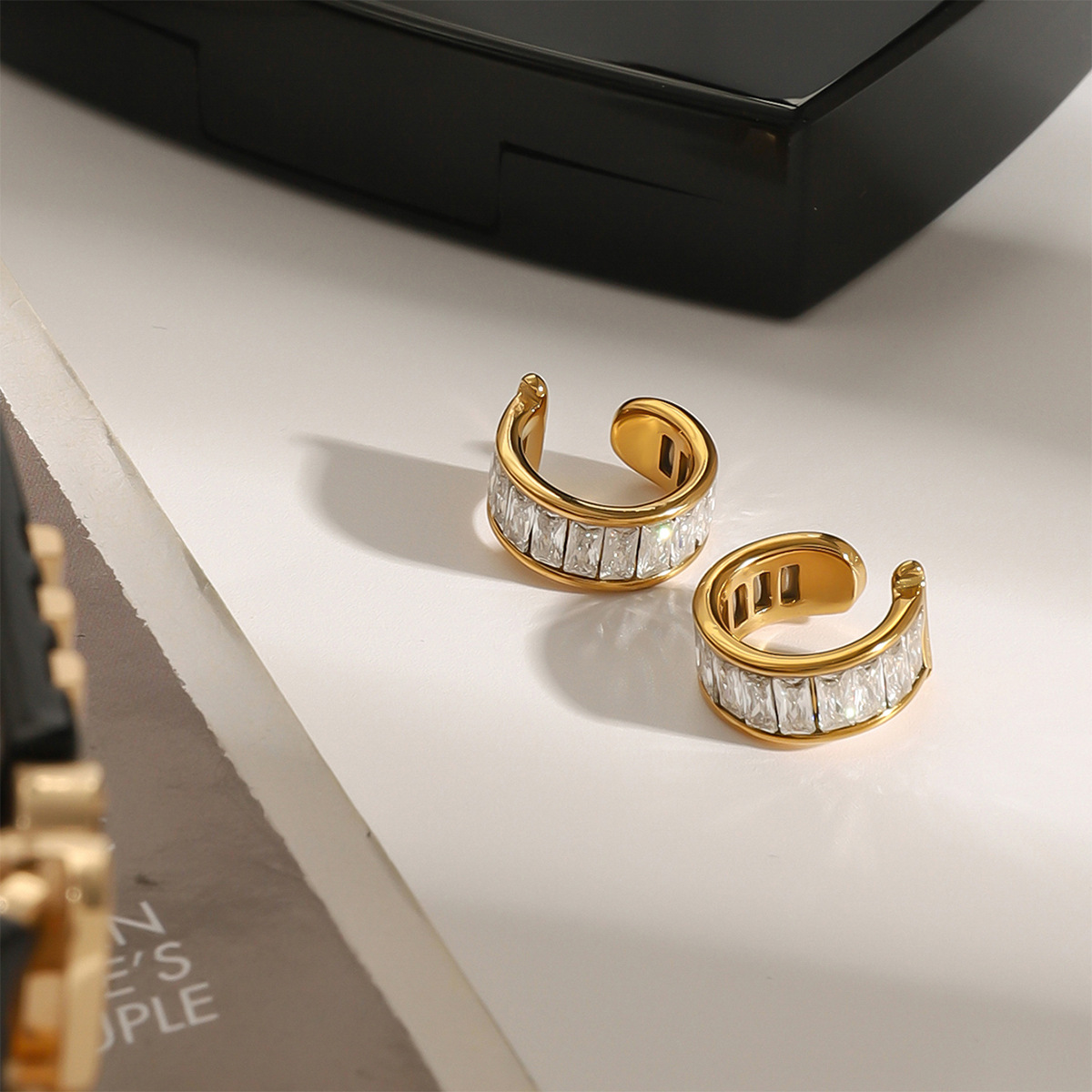 Jeting Europa y América acero inoxidable sin agujeros de orejas clips de orejas de diamante de alto nivel hueso de diamante de acero pendientes transfronterizos