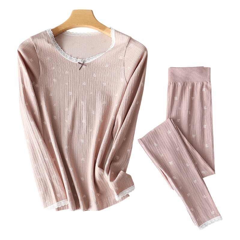 Ropa interior térmica de algodón de color Maple Leaf al por mayor 2024 primavera nuevo estilo cuello redondo sin costuras ropa de otoño pantalones largos traje mujeres