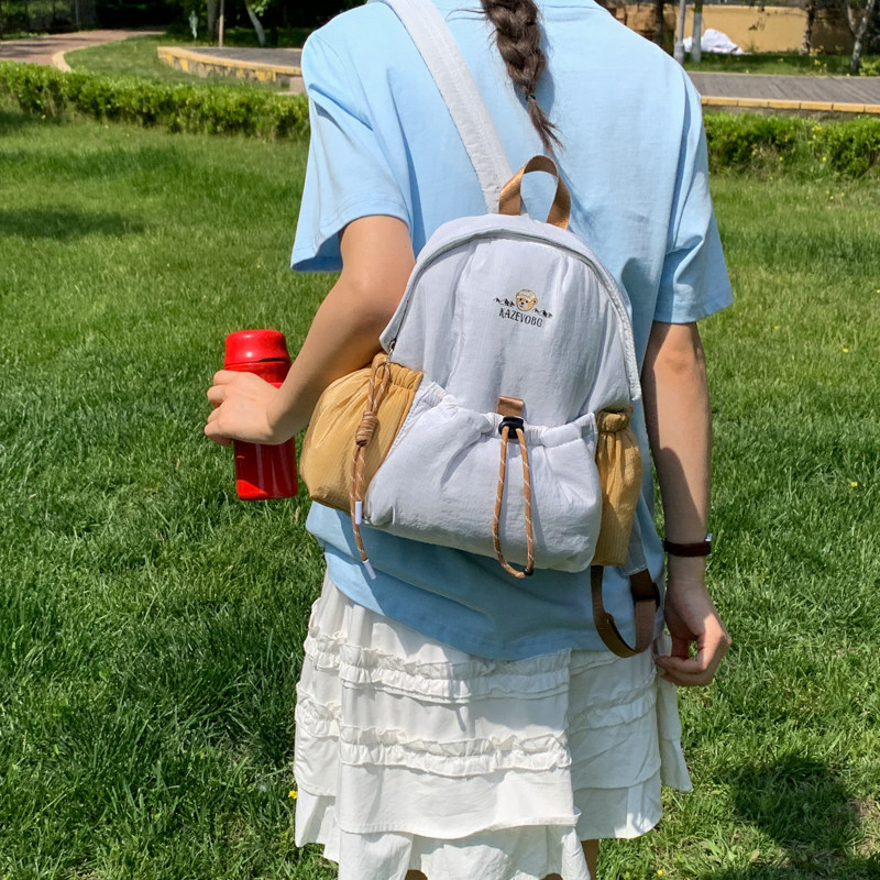 Nuevo estilo de viaje 2026 Bundokou mujer mochila funcional ocio impermeable cuerda de extracción al aire libre mochila de montaña de viento ligera